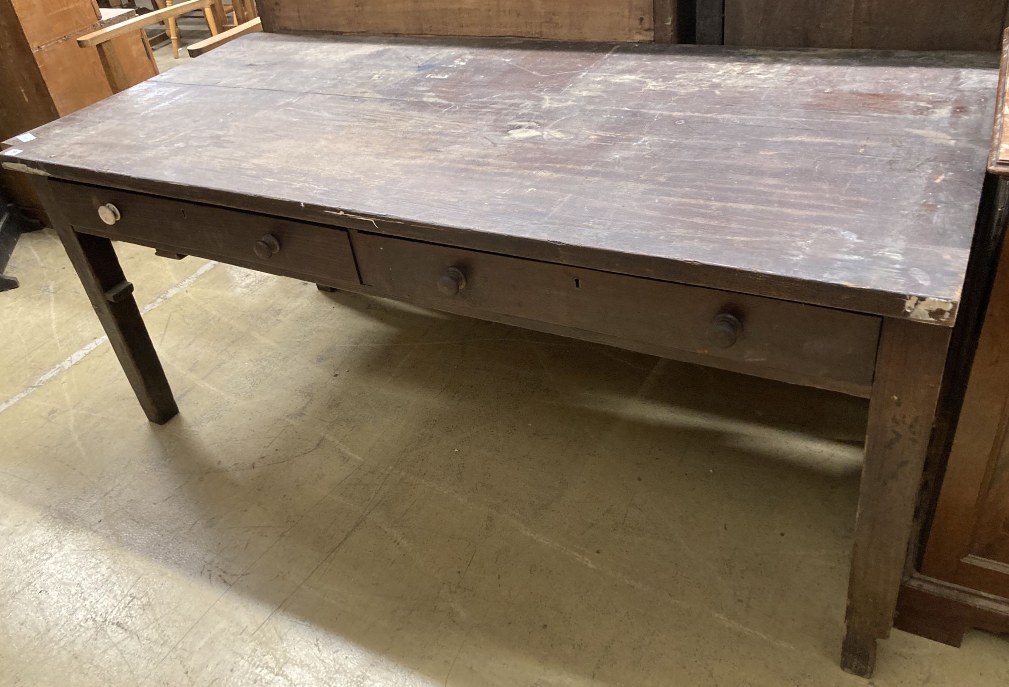 A 19th century pitch pine two drawer kitchen table, length 178cm, depth 81cm, height 76cm